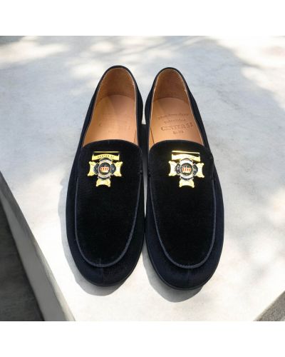 Moccasin Center 51 14569 black velvet with a gold-tone metal medallion