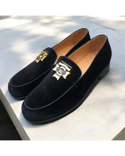 Moccasin Center 51 14569 black velvet with a gold-tone metal medallion