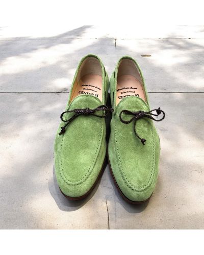 Moccasin Center 51 14778 green suede with a brown braided leather lace