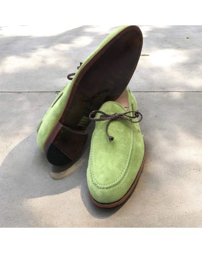 Moccasin Center 51 14778 green suede with a brown braided leather lace